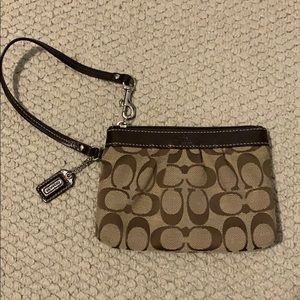Coach wristlet *perfect condition, barley used*
